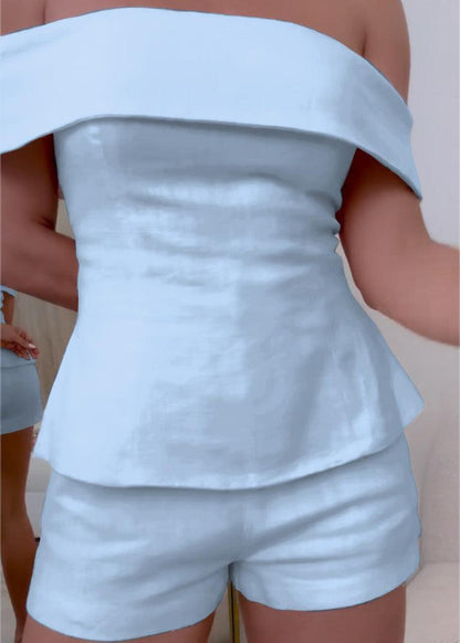 Traje de dos piezas de algodón y lino blanco